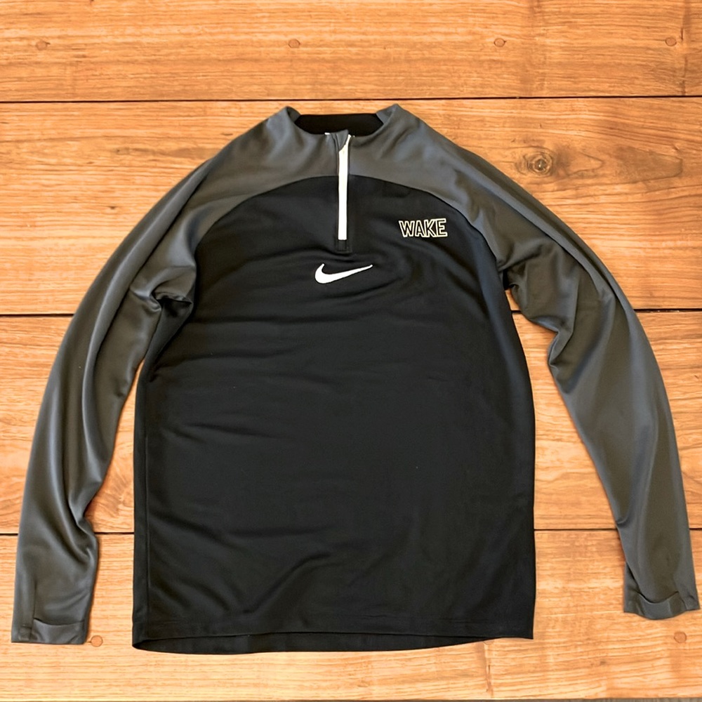 Nike Dri-Fit long sleeve pullover, six inch zipper. Wake WFU Ladies Medium